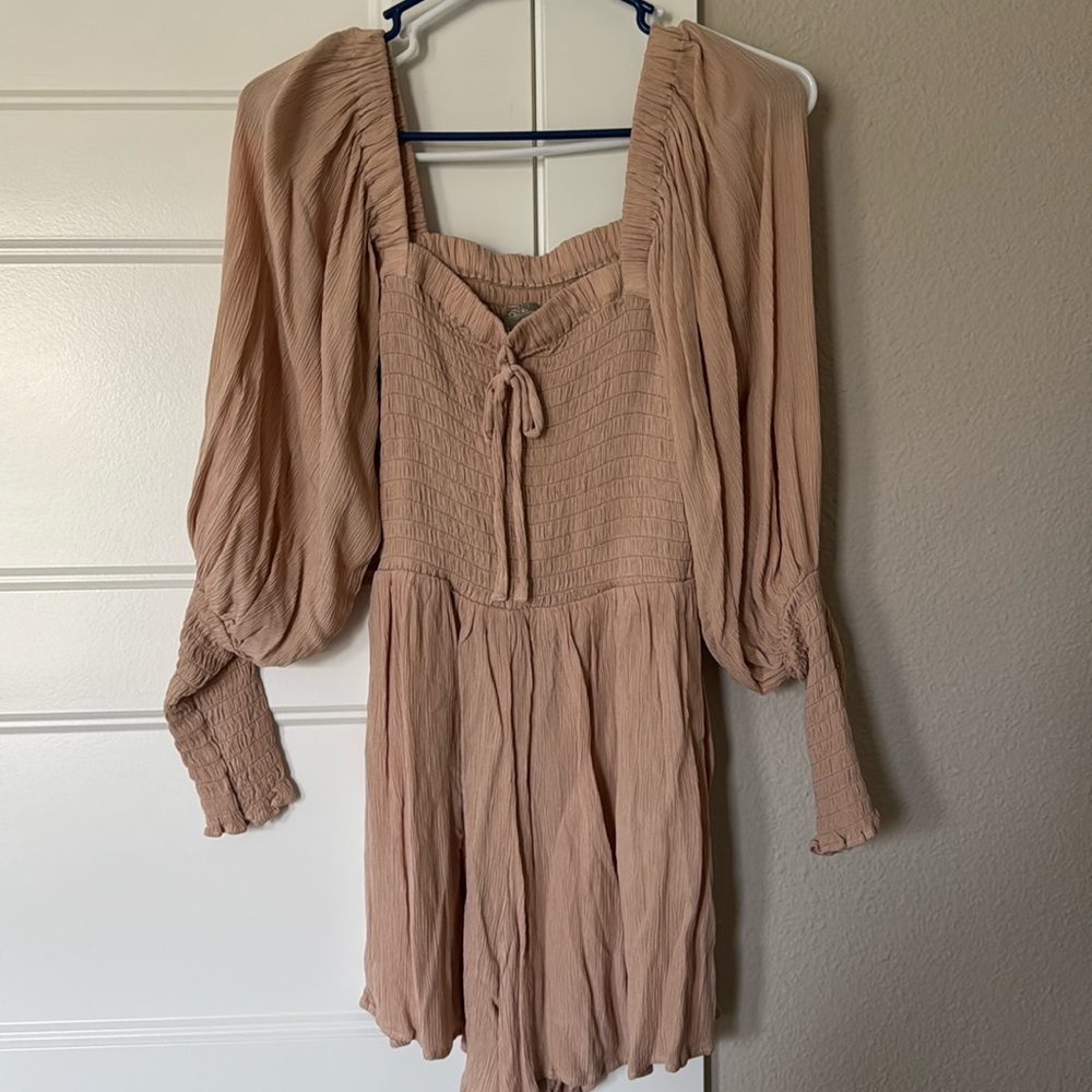 Baby pink, flowy romper.